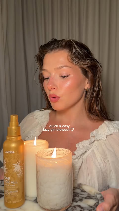 Instagram post by @sashalilliee for Aveda. Caption reads: [...] blowout using a 25-in-1 ✍🏼🥱🎀 ad the....