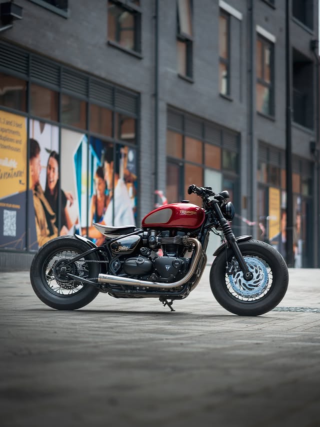 Instagram post by @thebonniebiker for Triumph Motorcycles. Caption reads: [...] to cheer you up 😁 #triumphbobber....