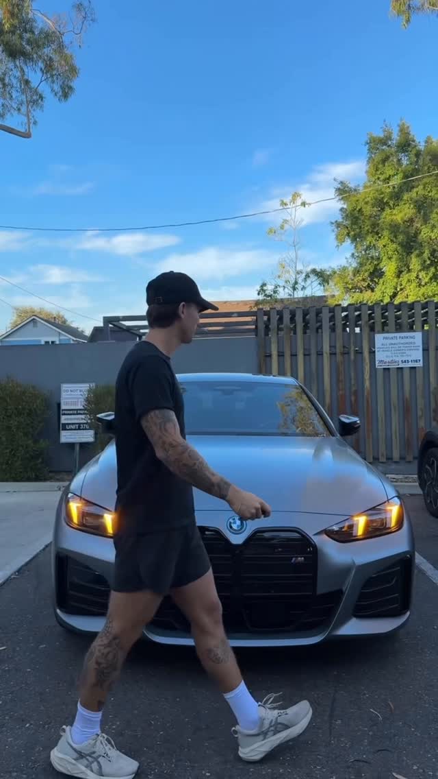 Instagram post by @teosworld_ for BMW USA. Caption reads: #ad Day 2 of the weekend vlog with @bmwusa & it....