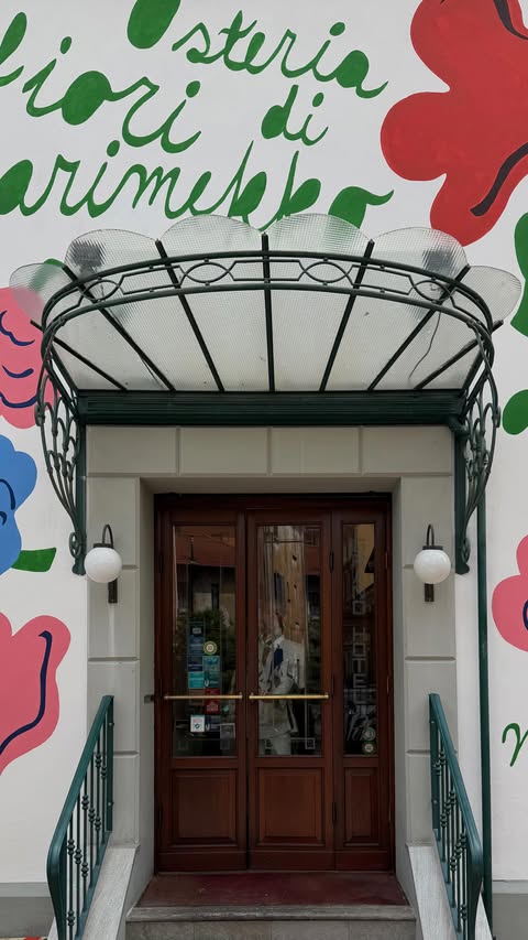 Instagram post by @theblackhairedboy for Marimekko. Caption reads: [...] to see this 🌸🌺🌼🌷 Osteria Fiori di....