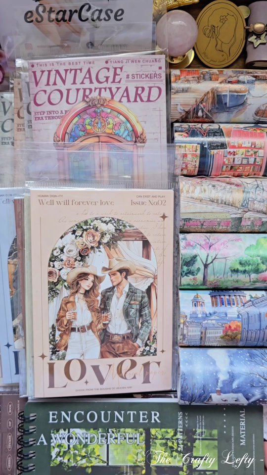 Instagram post by @thecraftyleftystudio for eStarCase. Caption reads: ASMR Unboxing Journaling Supplies from....