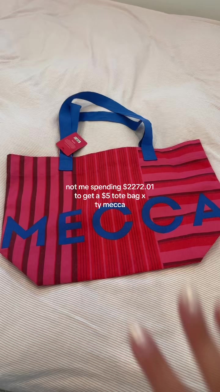 TikTok post by @ollygrasso for MECCA. Caption reads: not gonna lie she is a cute beach bag tho….☀️👙....