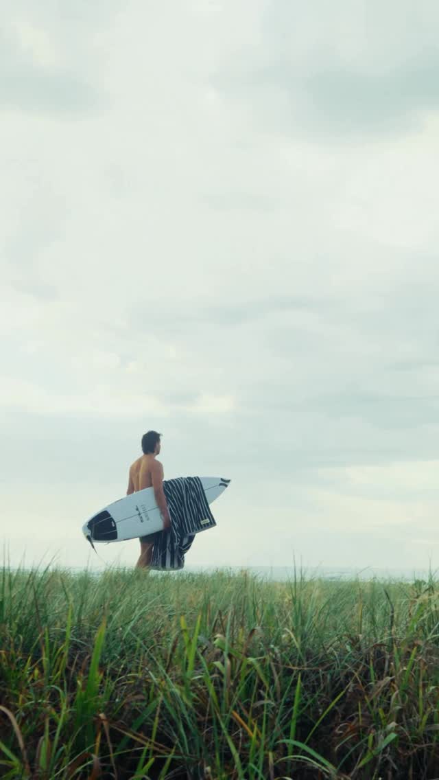 Instagram post by @connoroleary for Country Road. Caption reads: Summer is sorted with my @countryroad towel 
🎥....