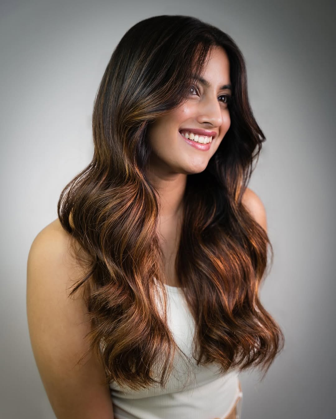 Instagram post by @twaritanagar for L’oréal Professionnel. Caption reads: #AD | Say hello to the ultimate brown makeover 🤎✨....