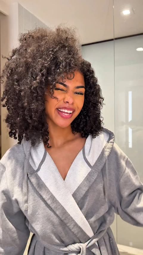 Instagram post by @destineewray for Conair. Caption reads: [...] struggled to define my curls but the @conair....