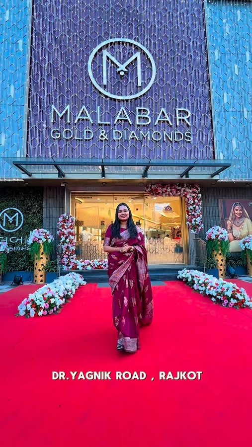 Instagram post by @jamnagar_ma_navu_shu for Malabar Gold and Diamonds. Caption reads: Malabar Gold & Diamonds રજૂ કરે છે: ‘આર્ટિસ્ટ્રી....