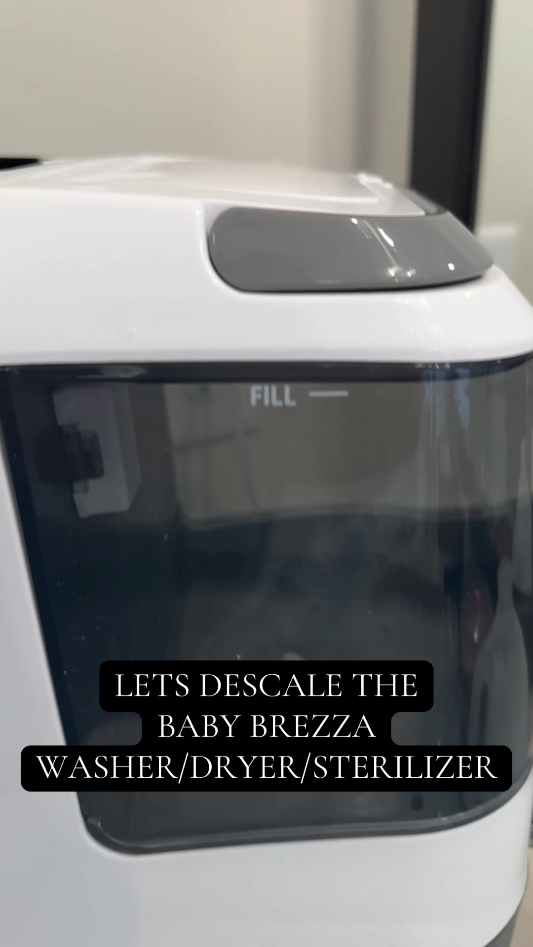 TikTok post by @ashleybechter for Baby Brezza. Caption reads: How to descale your @Baby Brezza....