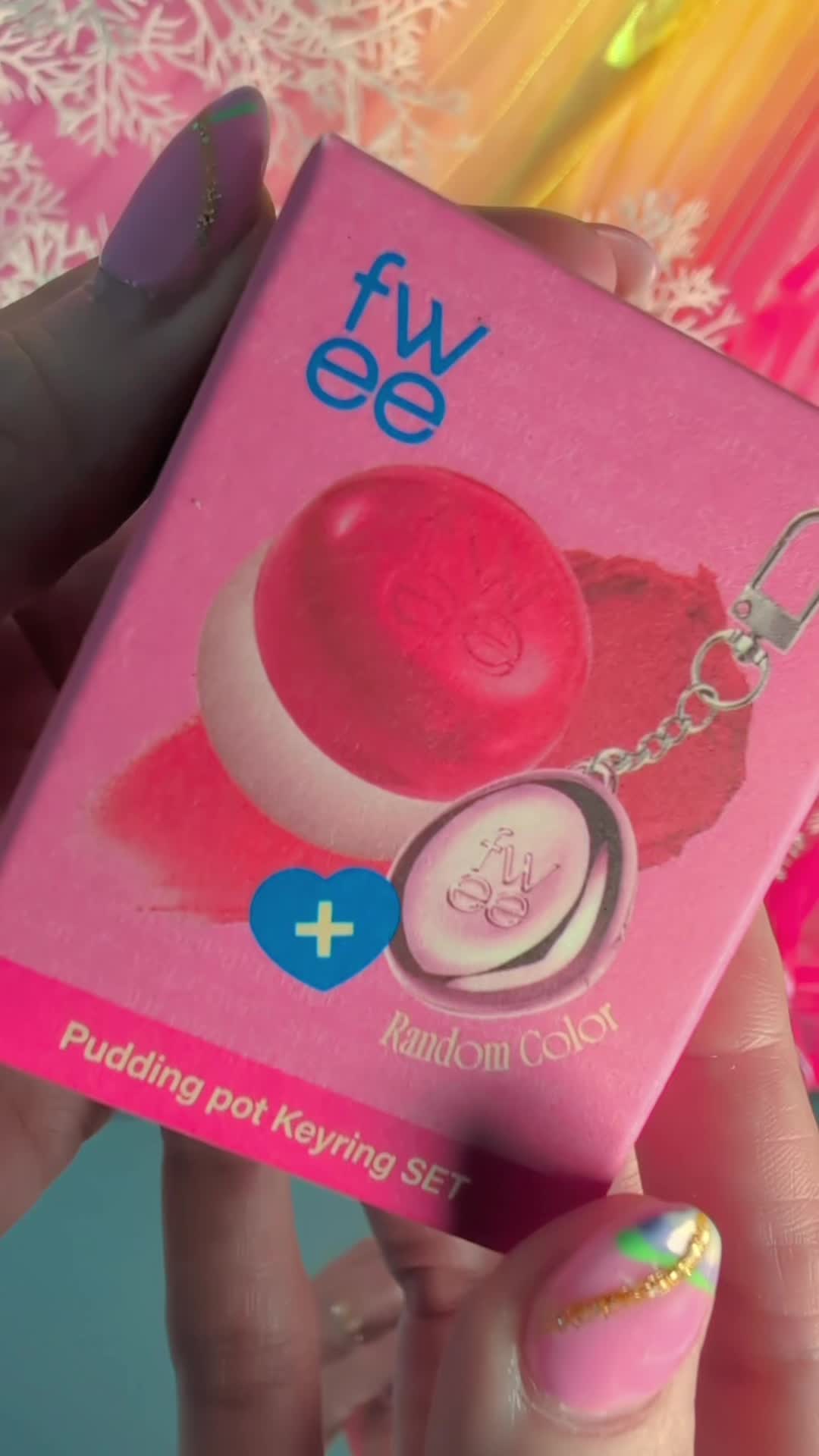 TikTok post by @katerinamiami108 for Fwee Makeup. Caption reads: Refilling this super-cute keychain is pure joy!....