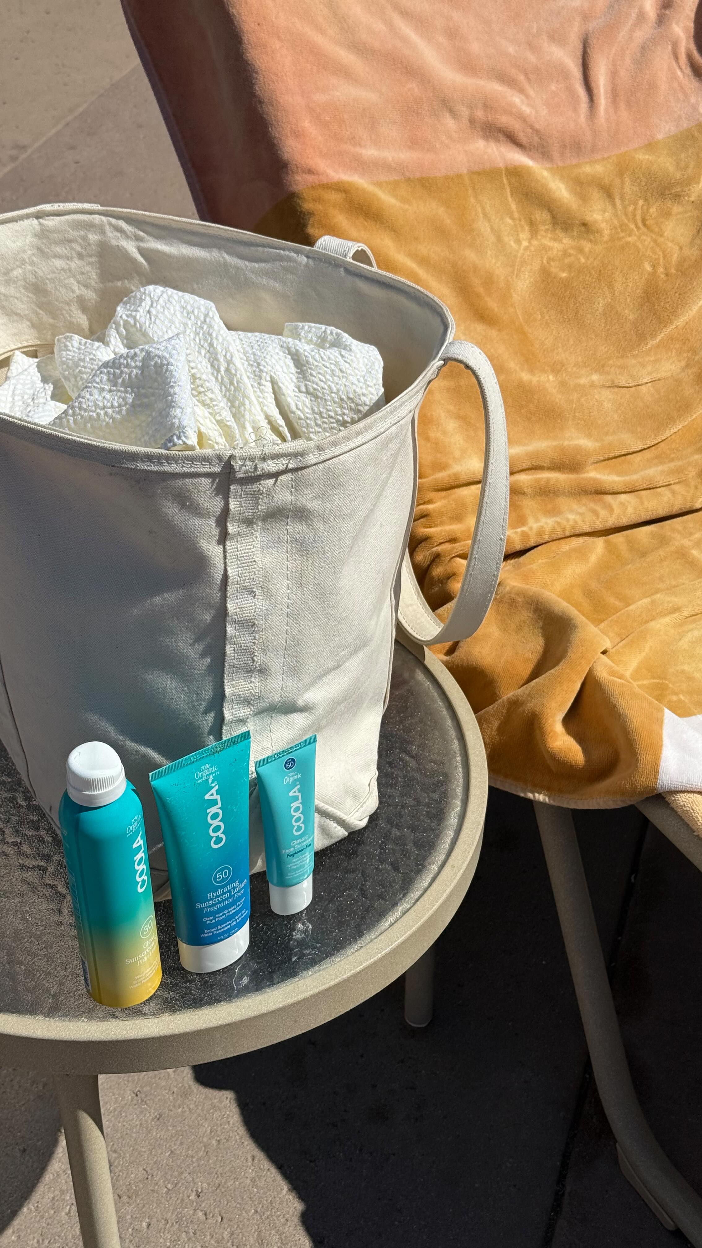 Instagram post by @ellamiller for COOLA. Caption reads: [...] guide for the beach lover in your life!....