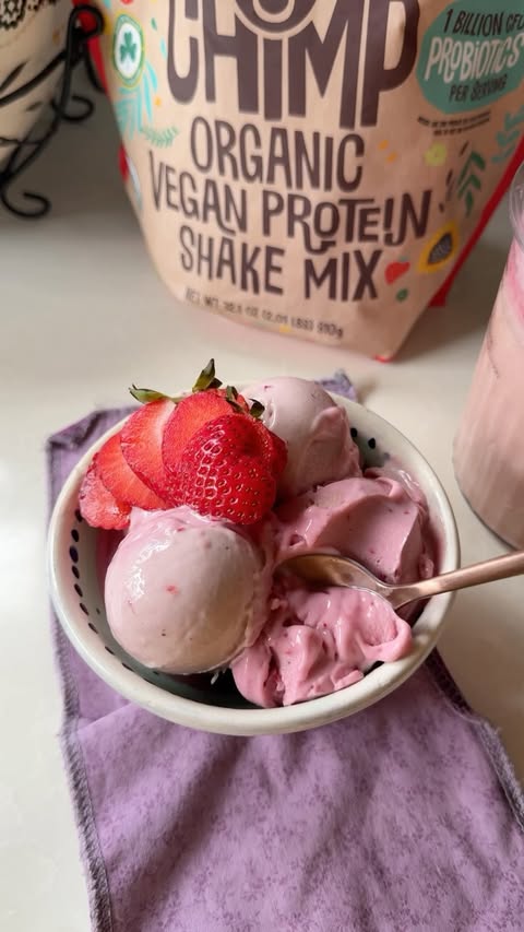 Instagram post by @samcookskindness for EarthChimp. Caption reads: [...] with the new Strawberry flavor from....