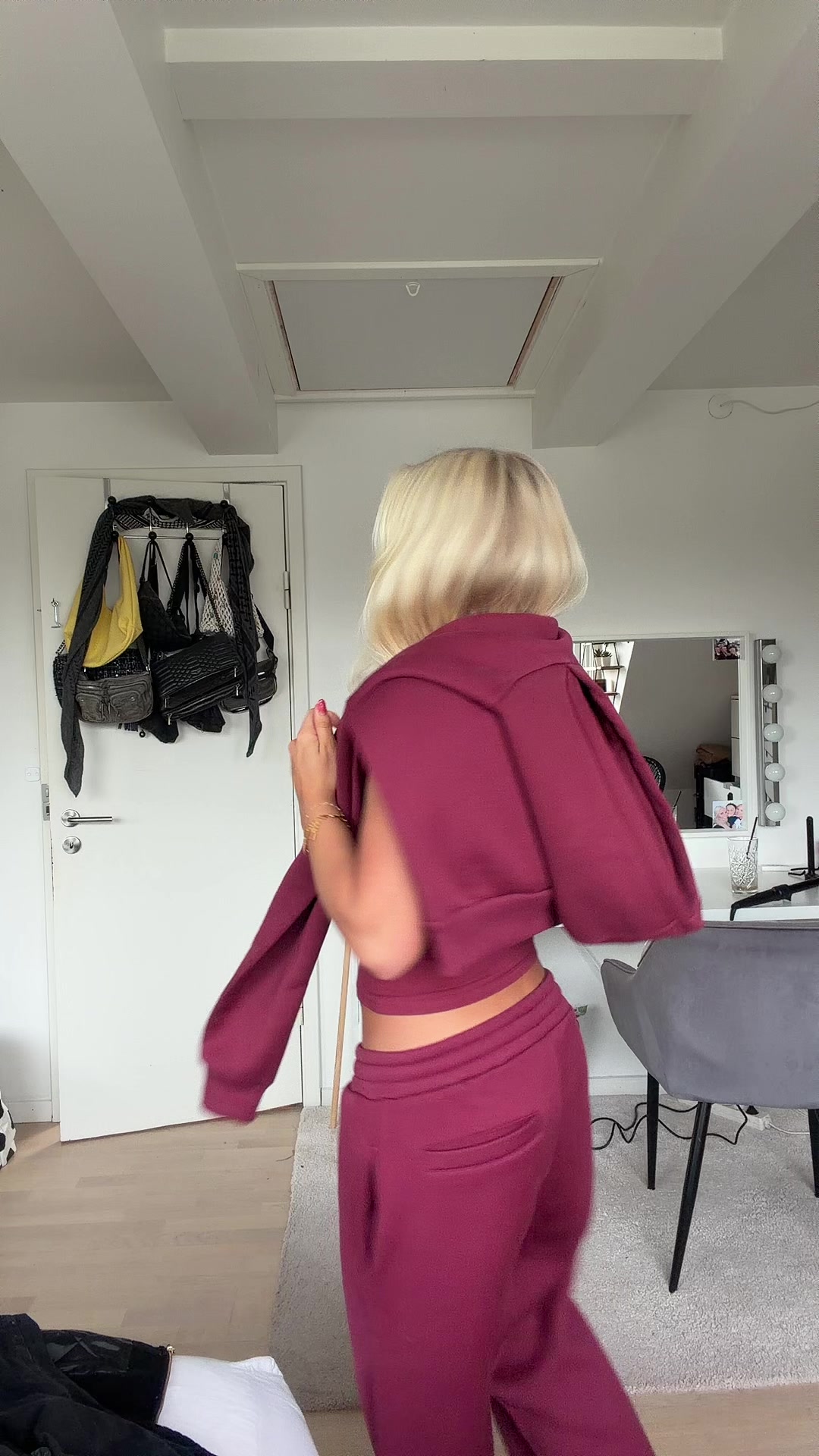 TikTok post by @laurairgens for cusbclo. Caption reads: Tracksuit from @cusbclo <33333 🧡🧡🧡🧡 #reklame .