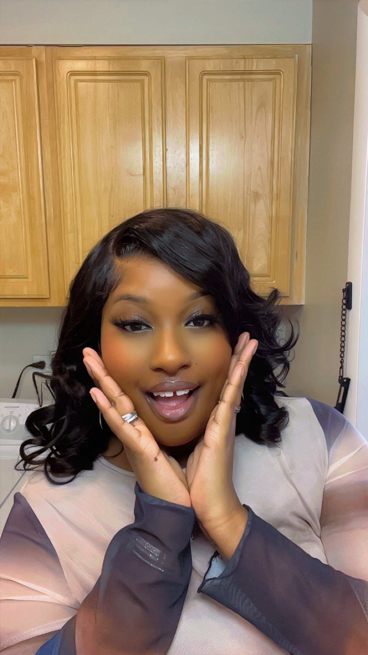 TikTok post by @budgetbabyy for Ashimary Hair. Caption reads: This pre styled ready to wear wig by @Ashimary....