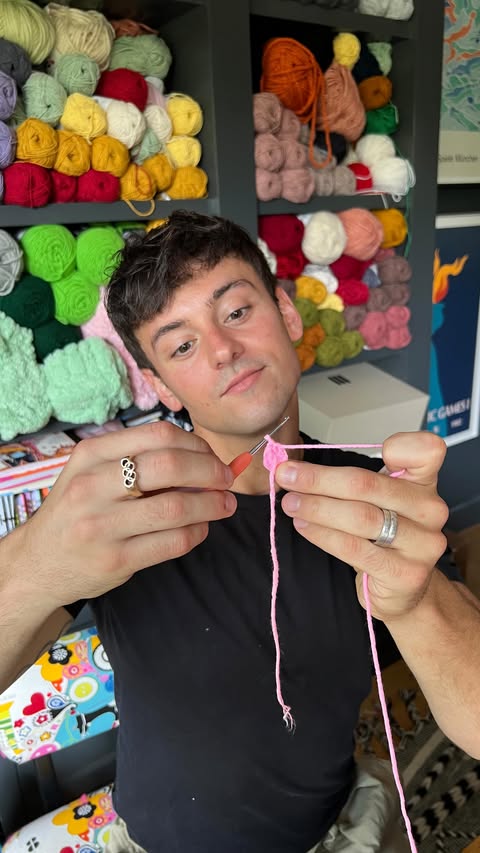 Instagram post by @madewithlovebytomdaley for Hobbycraft. Caption reads: Tom Daley is back with another crochet tip!....