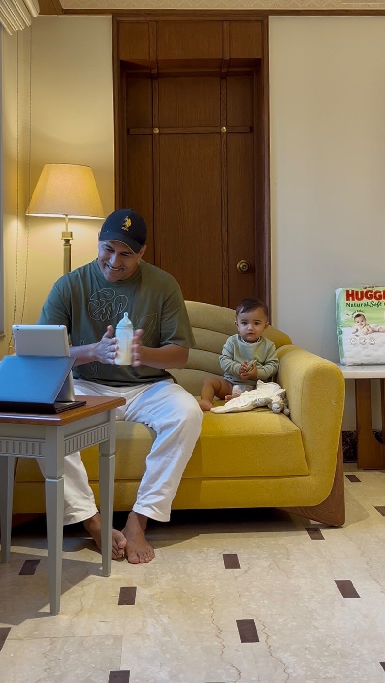 Instagram post by @oldsuitcasee for Huggies. Caption reads: Being a dad means mastering the art of....