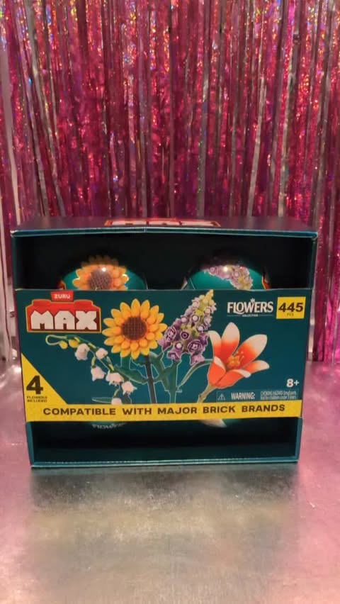 Instagram post by @laila_and_aliza_show for ZURU Toys. Caption reads: The Zuru MAX Flowers Premium Collection Mystery....