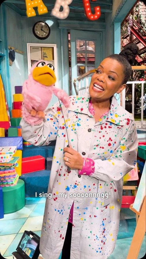 Instagram post by @yvettenicolebrown for Sesame Street. Caption reads: [...] an exclusive look at her visit to Sesame....