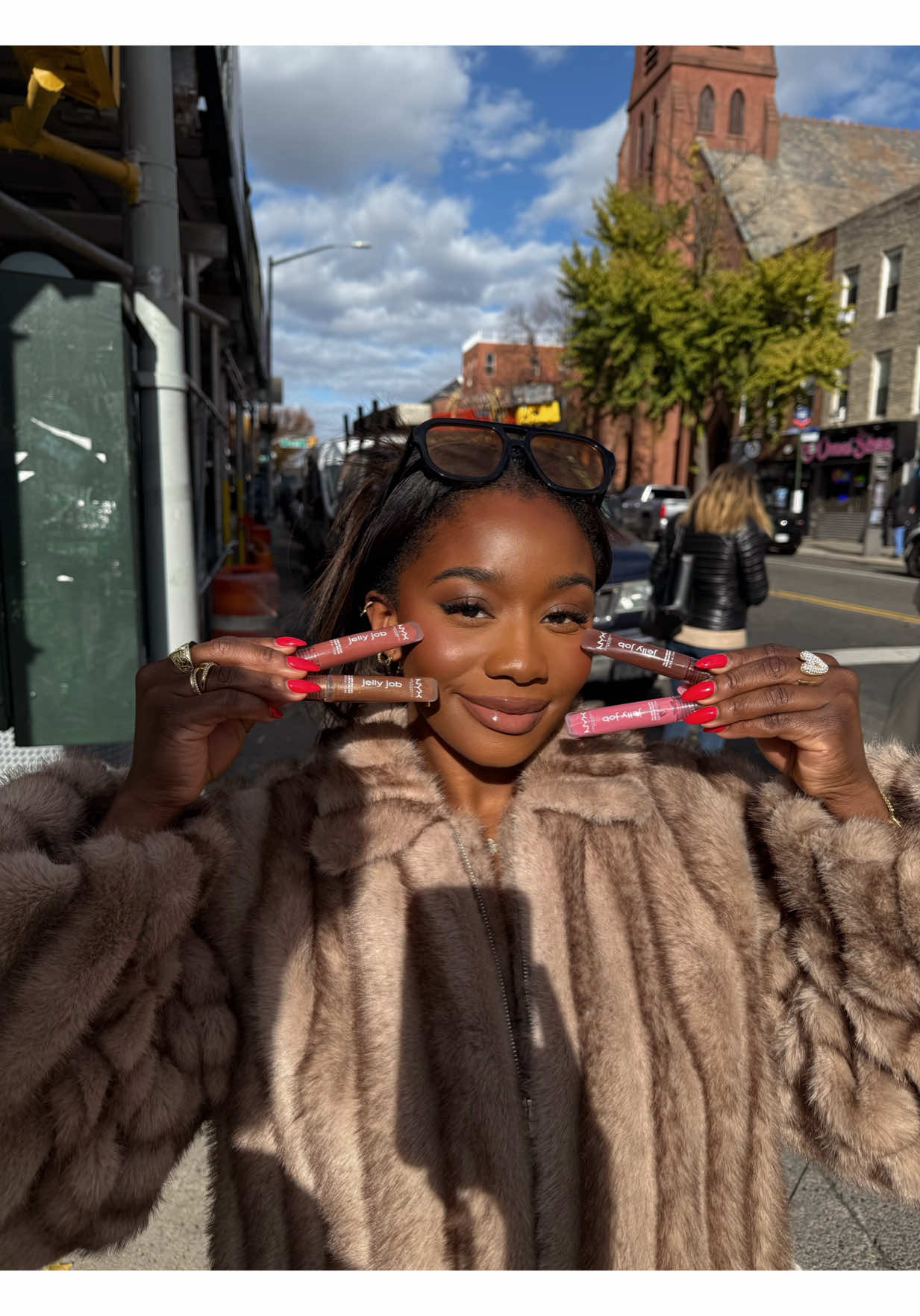 TikTok post by @abakasante for NYX Cosmetics. Caption reads: My gloss has places to be… just like me 💅🏾😚....