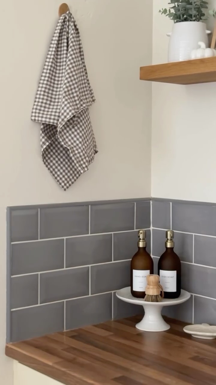 Instagram post by @athomewithfifi for NAMIE HOME. Caption reads: [...] amber kitchen dispenser bottles from....