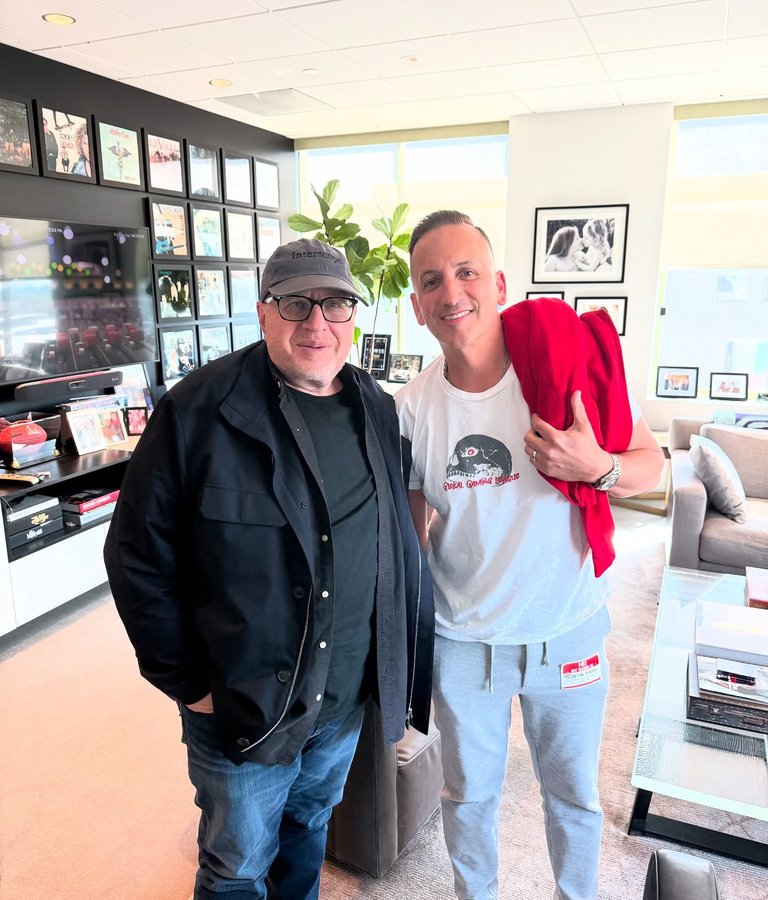 Instagram post by @clintonsparks for Interscope Records. Caption reads: Welcome back home to Interscope records. 

This is....