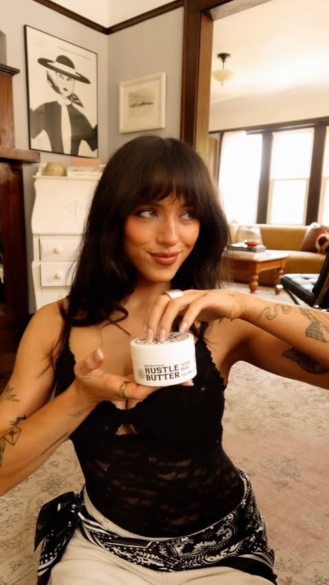 Instagram post by @jaynexhansen for Hustle Butter. Caption reads: [...] give your tattoos all the love with....