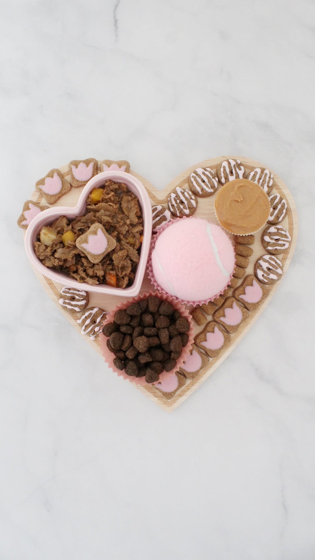 Instagram post by @barkleydoodles for Earthborn Holistic Pet Food. Caption reads: 💕🐶 Valentines Barkuterie Board DIY! 🐶💕⠀
This....