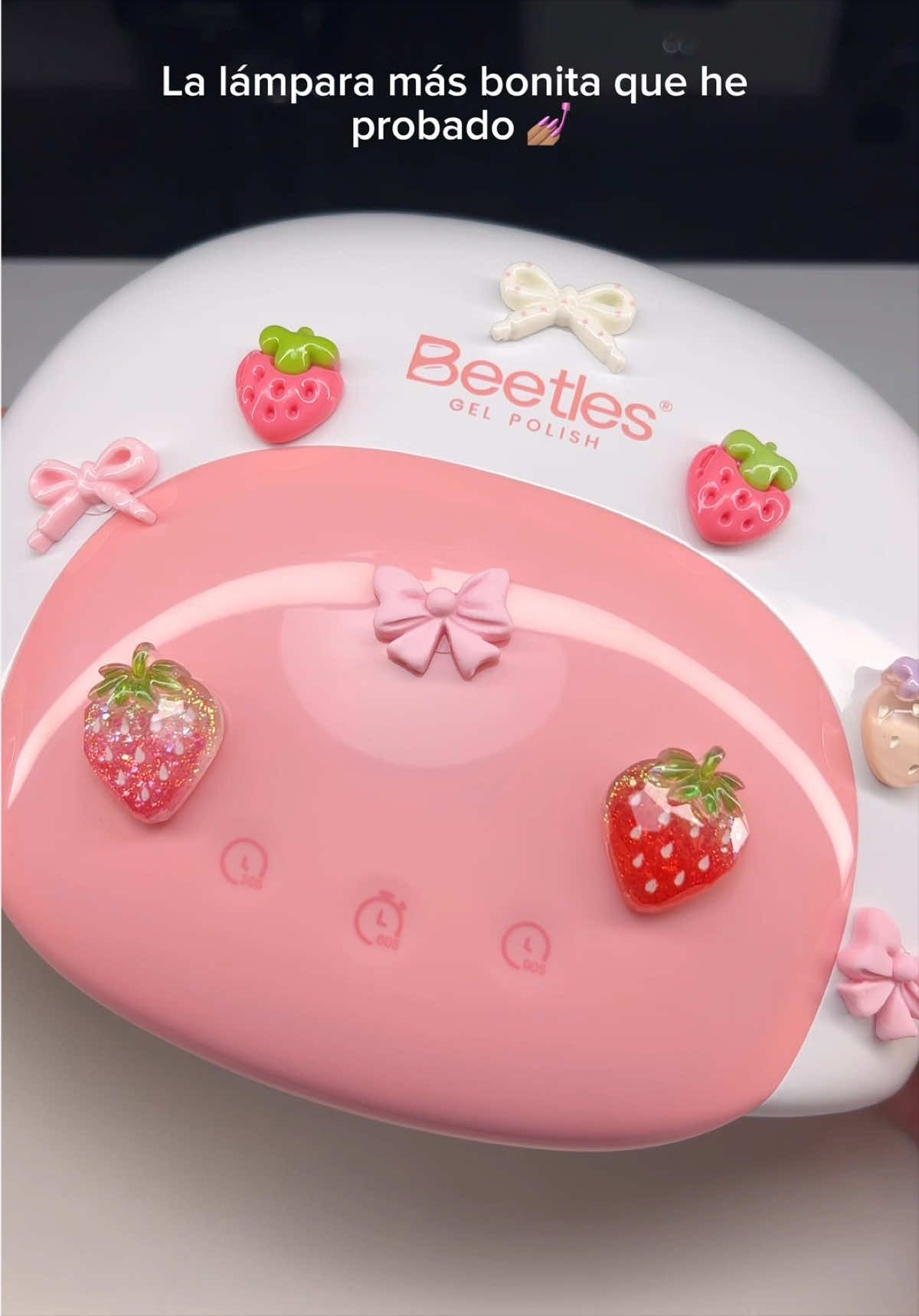 TikTok post by @heidy_beltrand for BeetlesGelPolish. Caption reads: [...] probado 💅🏽🎀✨ UV Candy nail lamp....