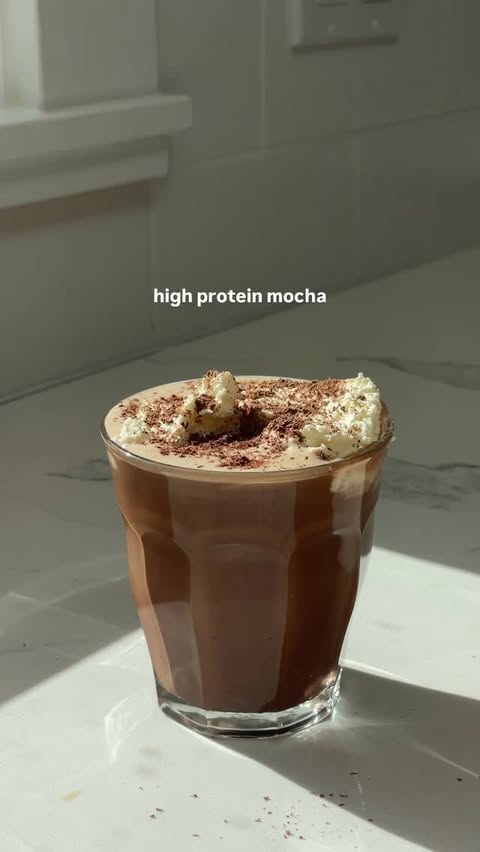 Instagram post by @sweatysweetpotato for Equip Foods. Caption reads: been obsessed with this high protein mocha to warm....