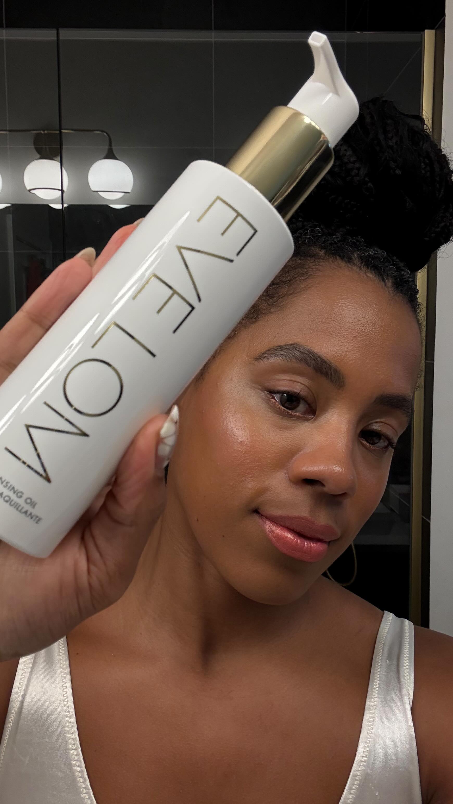 Instagram post by @buymechanel for EVE LOM. Caption reads: The entire day melts away in seconds. ✨ @evelom’s....