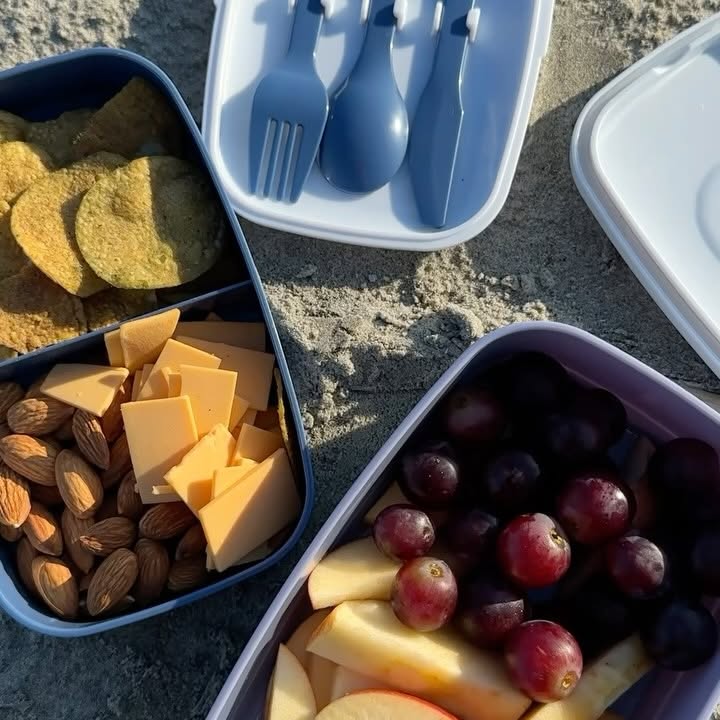Instagram post by @jennaliveswell for Follow Your Heart. Caption reads: #ad Sunset 🤝cheese board bento box....