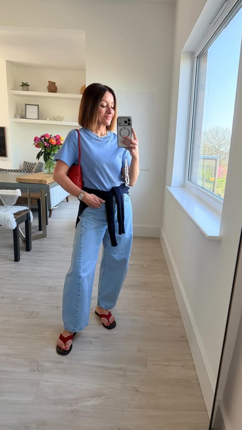 Instagram post by @missionstyle_ for MINT VELVET. Caption reads: [...] barrel leg jeans Red suede flip flops....