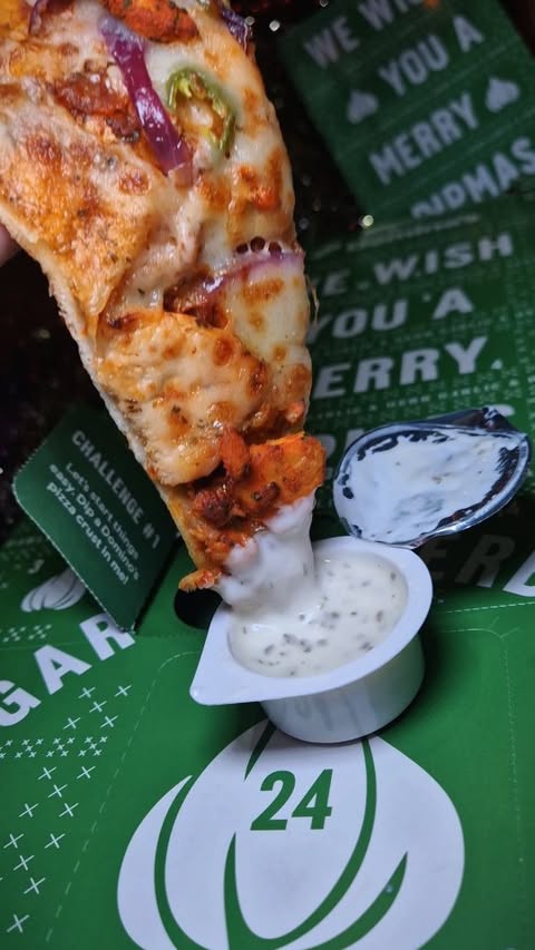 Instagram post by @eat_with_radz for The Influence Room. Caption reads: @dominos_uk
《AD/Gifted》
Merry Dipmas! @dominos_uk....