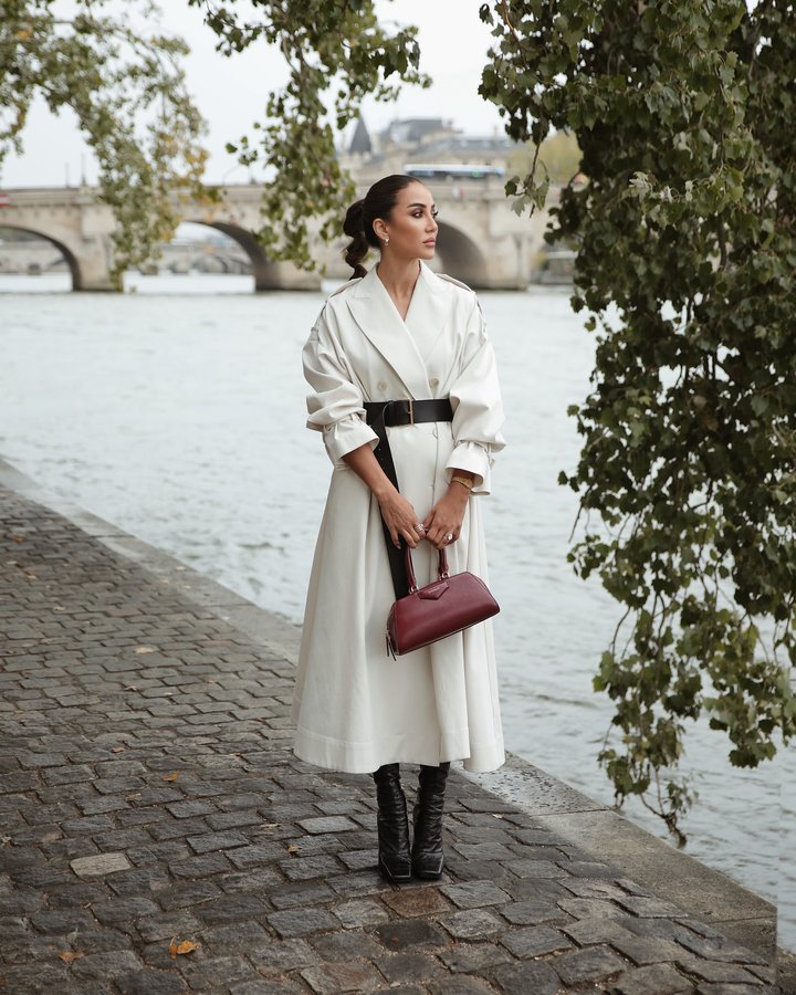 Instagram post by @tamara for GIVENCHY. Caption reads: It poured rain and fashion on @givenchy day.