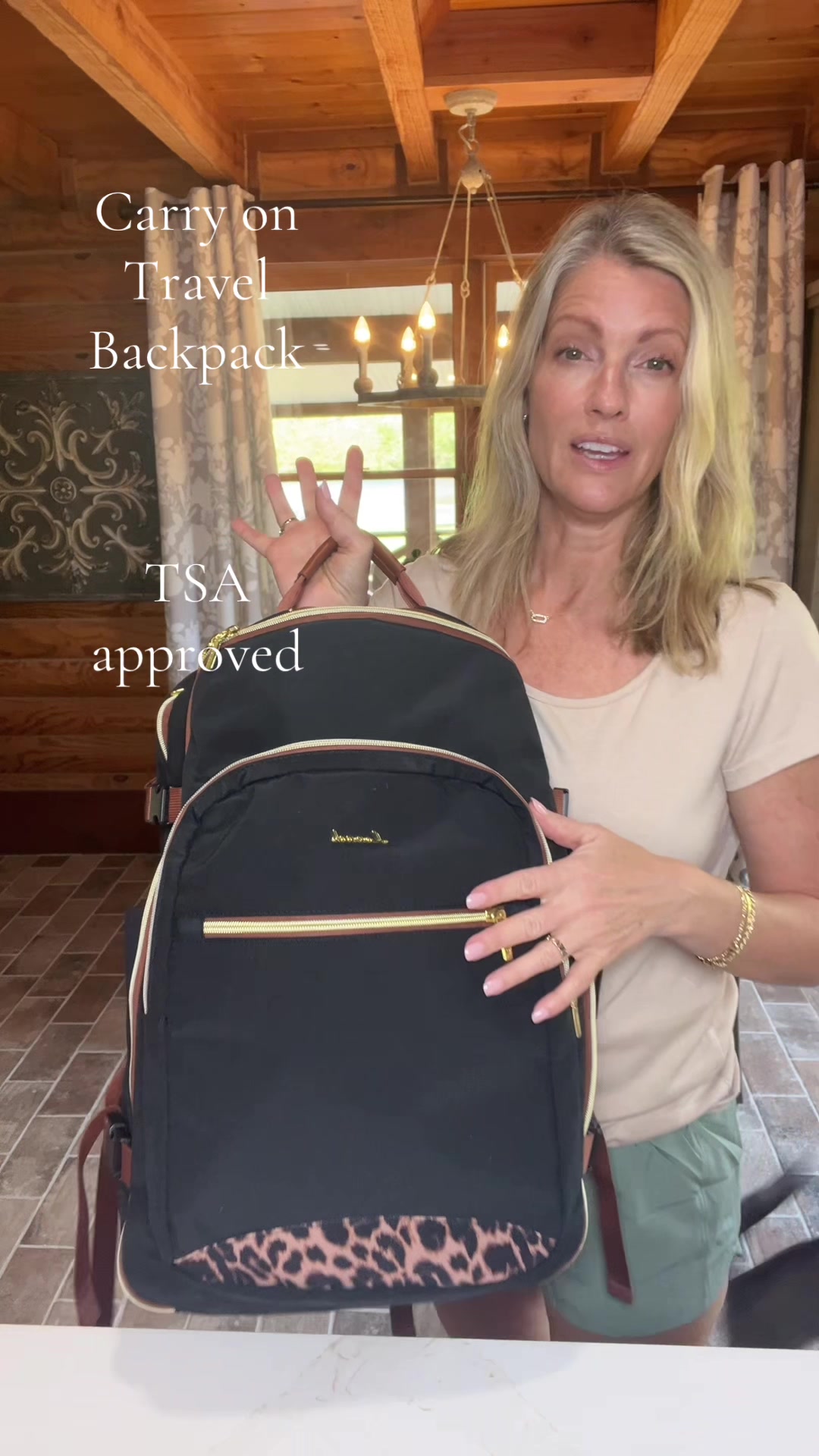 TikTok post by @shannan_leigh for Lovevook. Caption reads: @Lovevook Bags Carry On Travel Backpack🖤TSA [...].