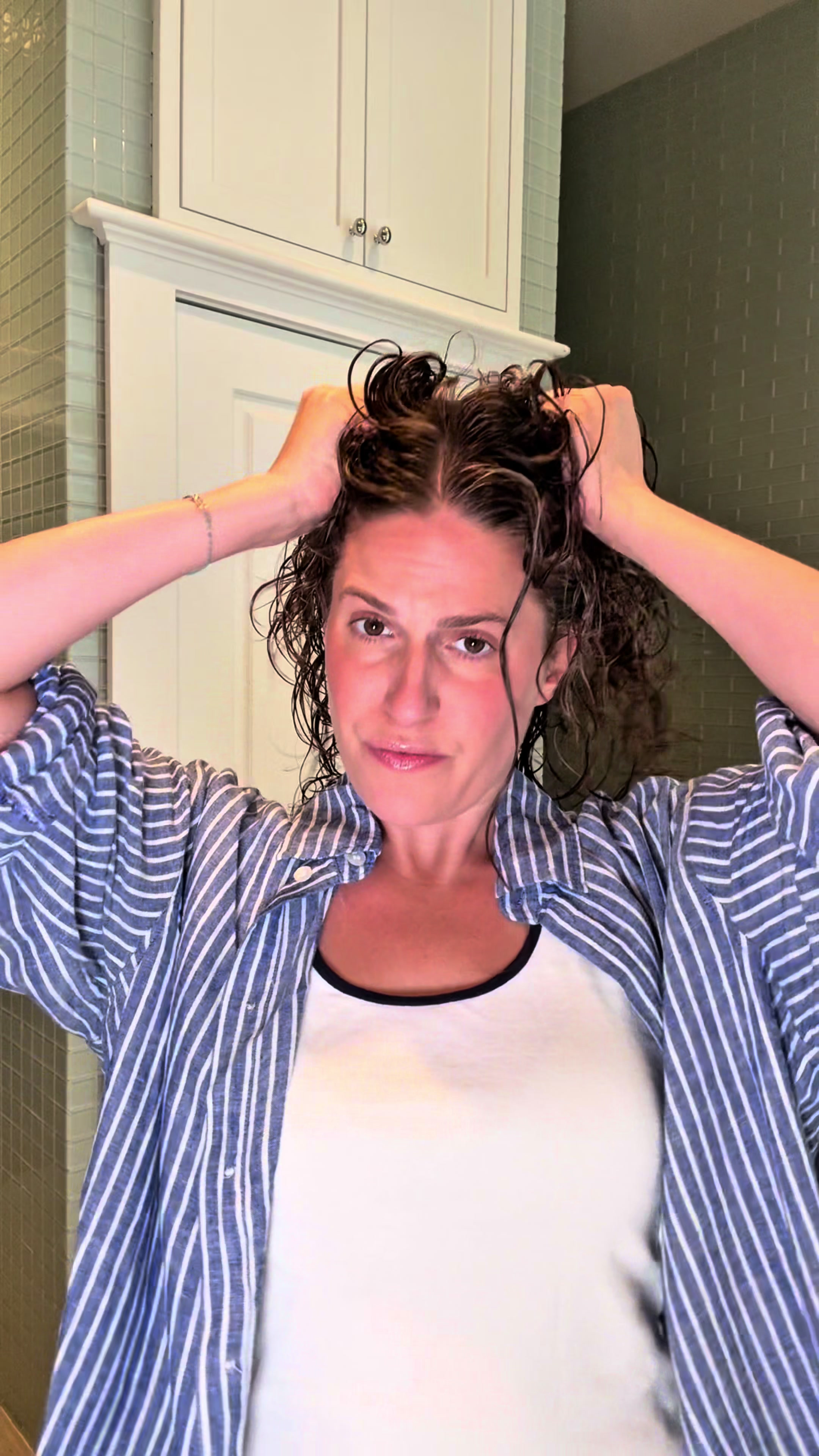 TikTok post by @lizzieloupp for Ulta Beauty. Caption reads: Not Your Mother’s hair oil is a GAME CHANGER for....