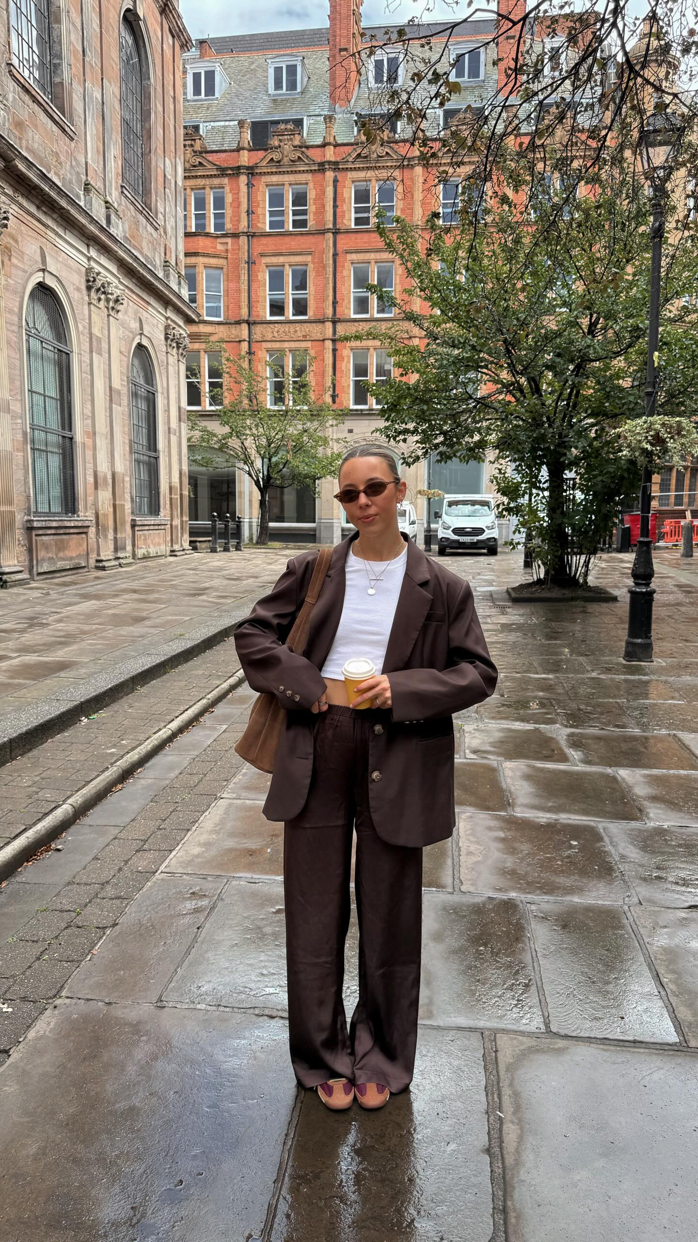 Instagram post by @rhiwanders for PEPPERMAYO. Caption reads: [...] 🍂🤎 trousers are from @peppermayo | ad . .....