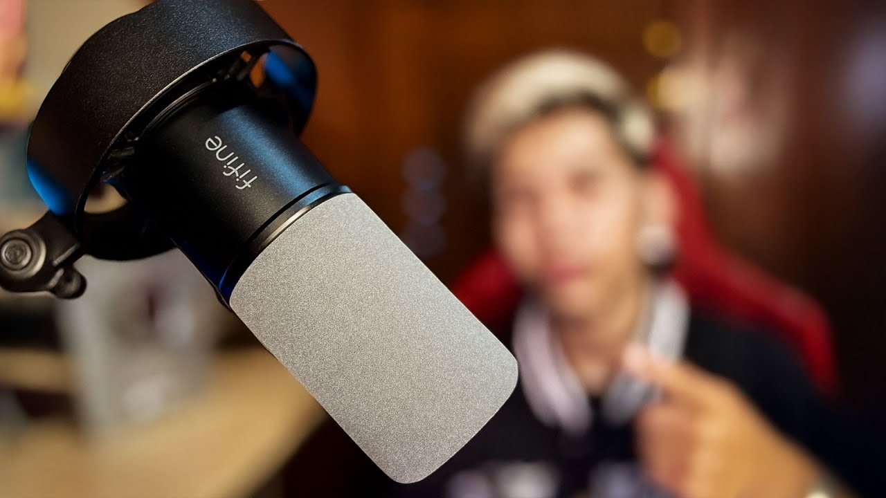 YouTube post by @LiAxLoGaGD for FIFINEMICROPHONE. Caption reads: The BEST MICROPHONE for Geometry Dash in 2026!.