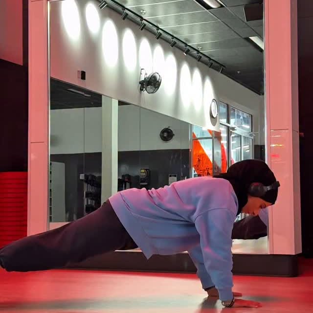 Instagram post by @sfm_fitness for EvolveYou. Caption reads: Didn’t grow up doing push-ups. Didn’t let that....