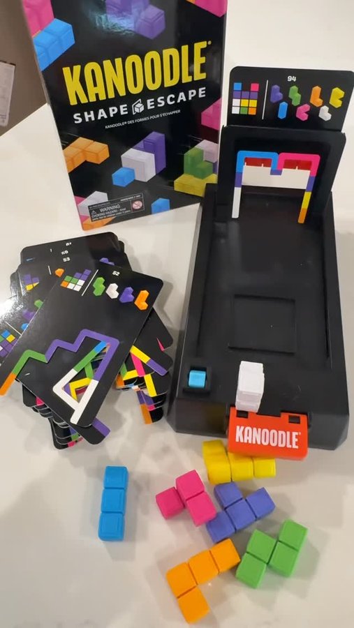 Instagram post by @michgirlmom for Educational Insights. Caption reads: @educationalinsights new game Kanoodle is sure to....