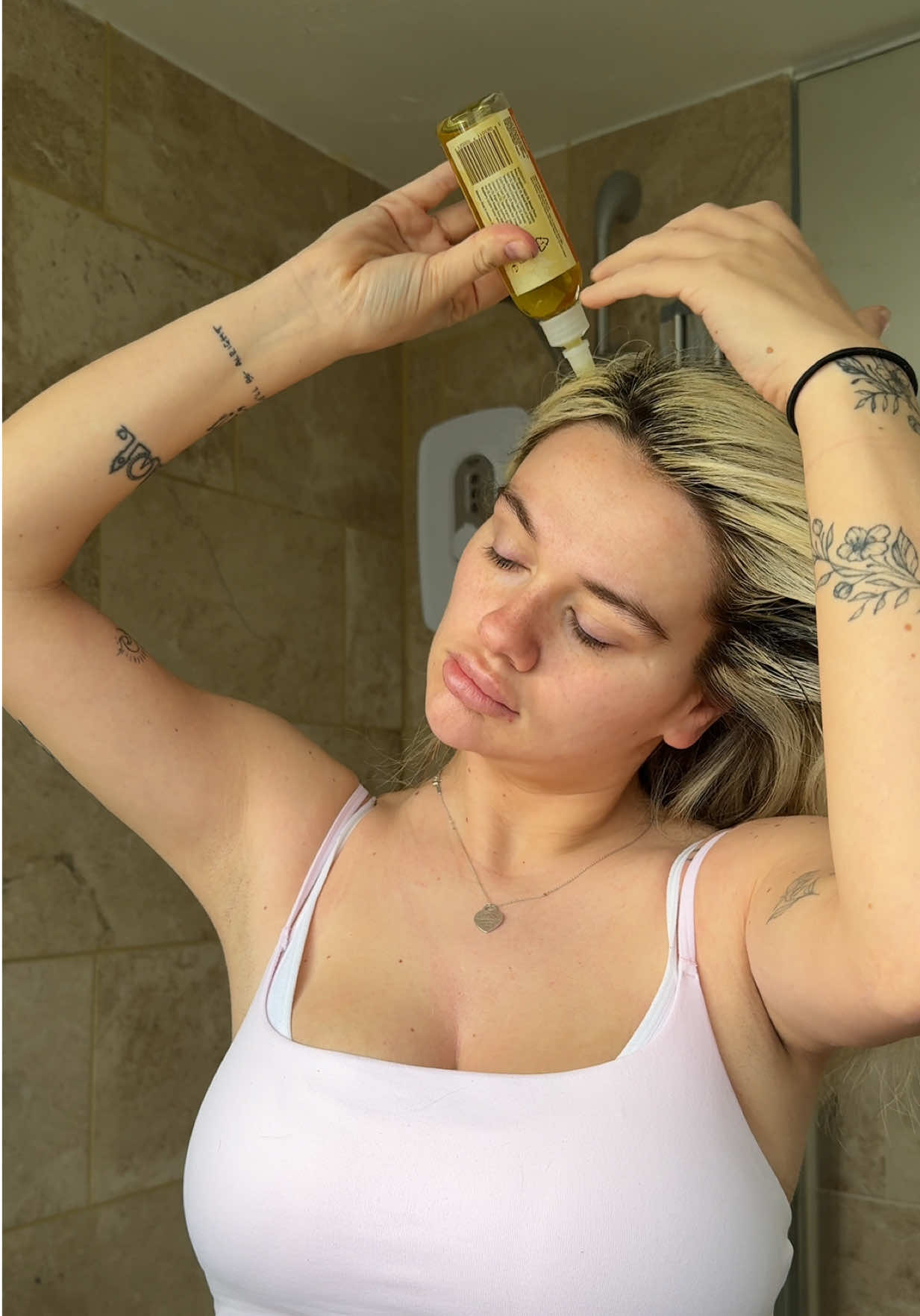 TikTok post by @bobzzeyy for Hair Syrup. Caption reads: Don’t sleep on @Hair Syrup gals #postpartum....