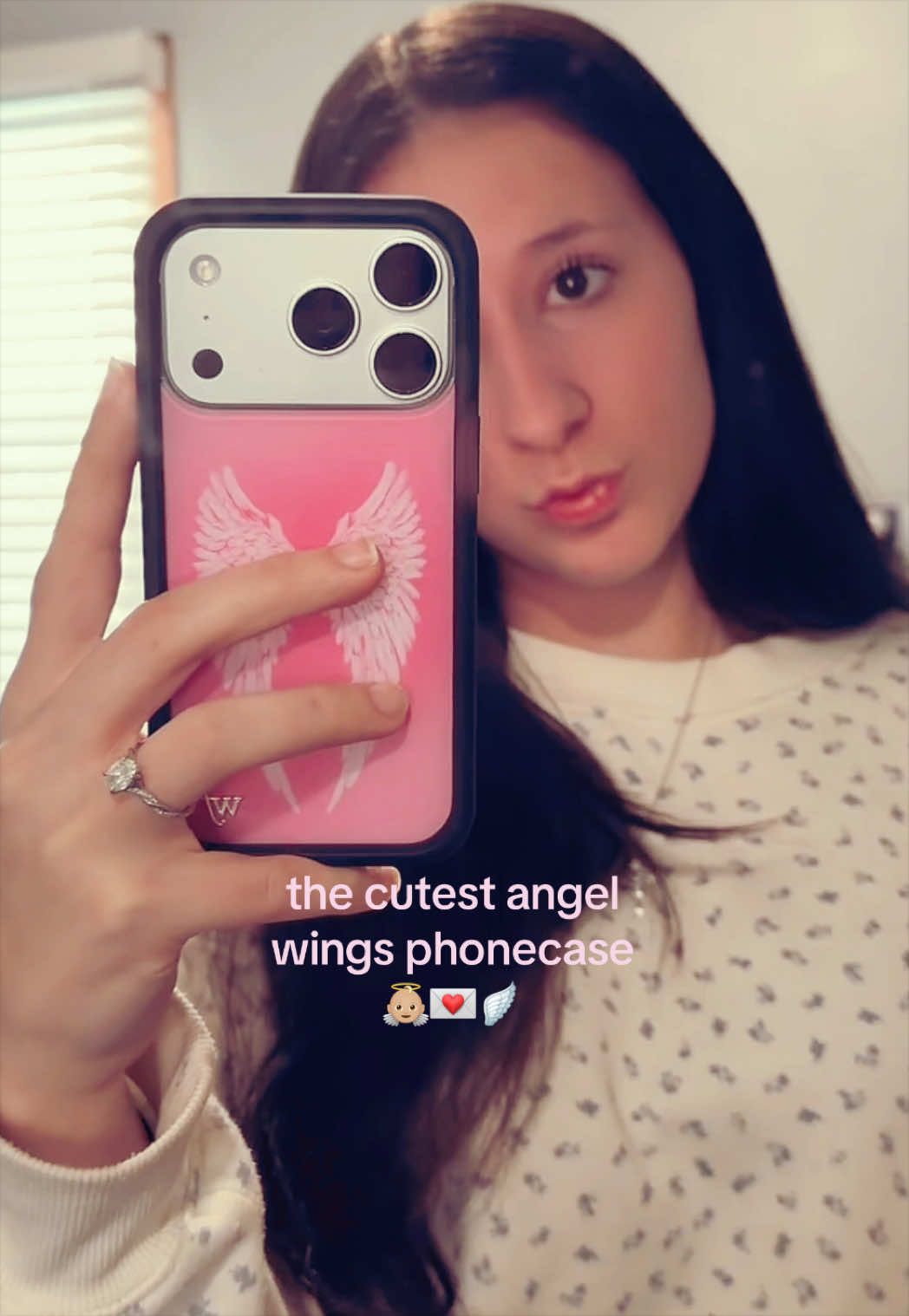 TikTok post by @uluvaves for Wildflower Cases. Caption reads: @Wildflower Cases this case so angelic and....