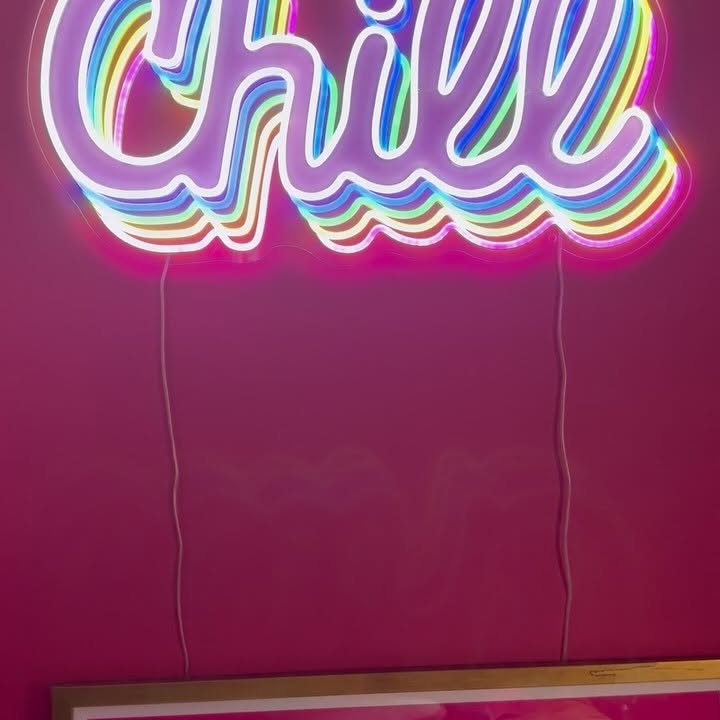 Instagram post by @aggielang for MyDomaine. Caption reads: How much neon is too much at home?! There is never....