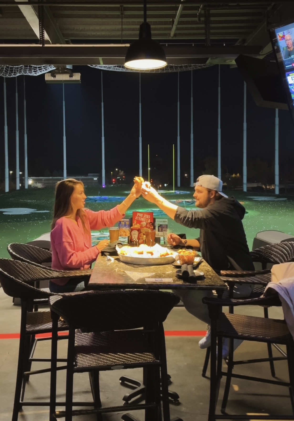 TikTok post by @djthoma for Topgolf. Caption reads: [...] for food, football and of course, golf....