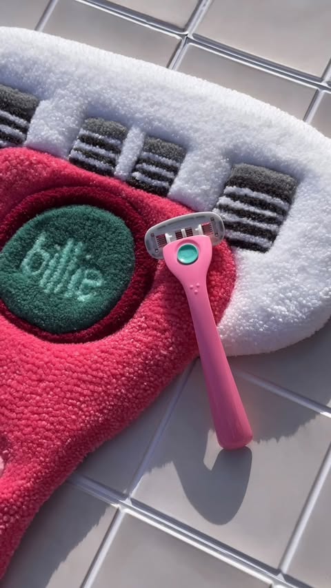 Instagram post by @tigerlilytufts for Billie. Caption reads: The @billie bath mat of our dreaaaaams 😩 [...].