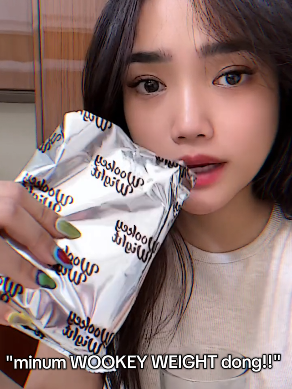 TikTok post by @justverfu for Wookey Weight. Caption reads: #fujian #fuji #wookeyweight #susuwookeycoklat....