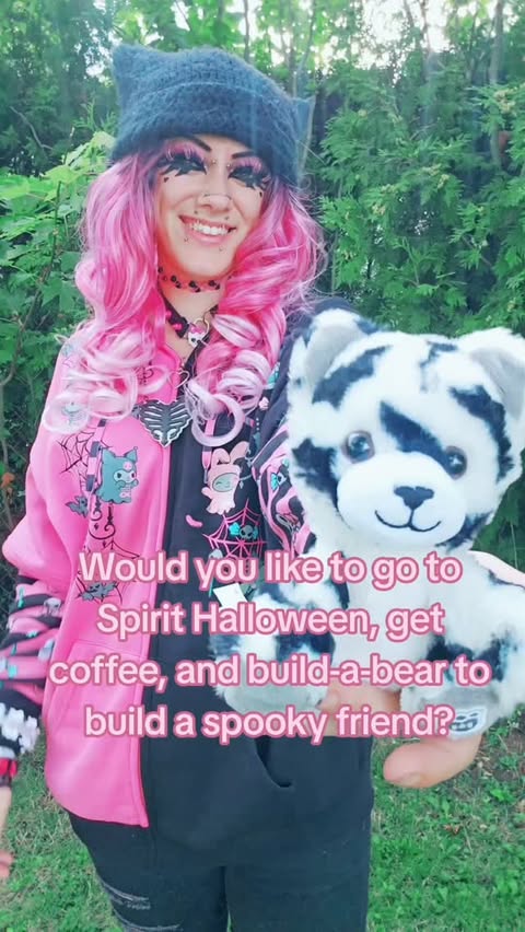 Instagram post by @clawed_beauty101 for Hot Topic. Caption reads: What kind of furry friend would you be building?....