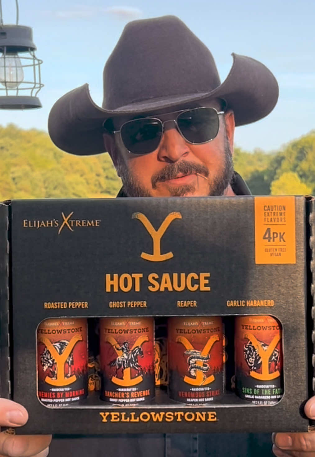 TikTok post by @country_tim1 for Elijah's Xtreme. Caption reads: [...] Hot Sauce #yellowstonetv #hotsauce....