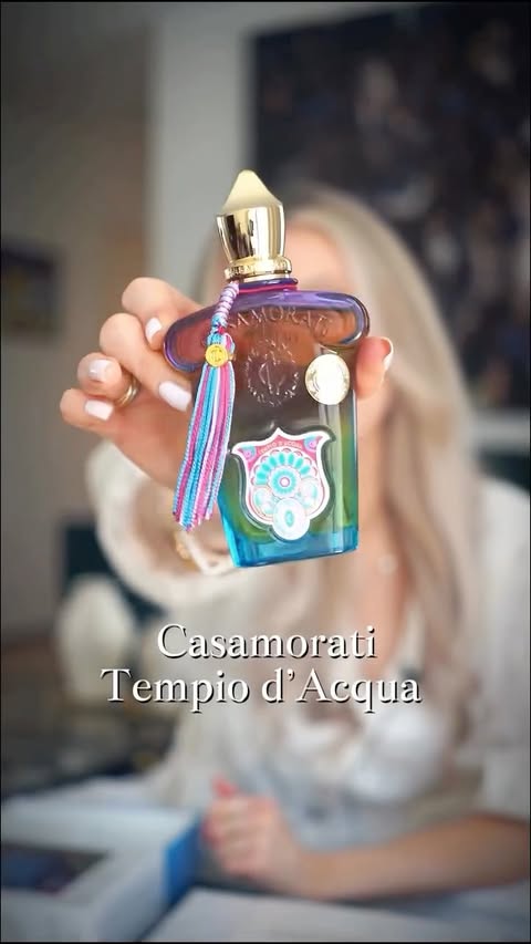 Instagram post by @angelina.patchouli for Xerjoff. Caption reads: [...] d‘Acqua! ✨ #Parfüm #angelinapatchouli....