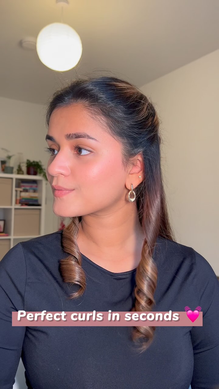 Instagram post by @mansiipalav for TYMO Beauty. Caption reads: The TYMO CURLPRO PLUS is so easy to use 🩷....