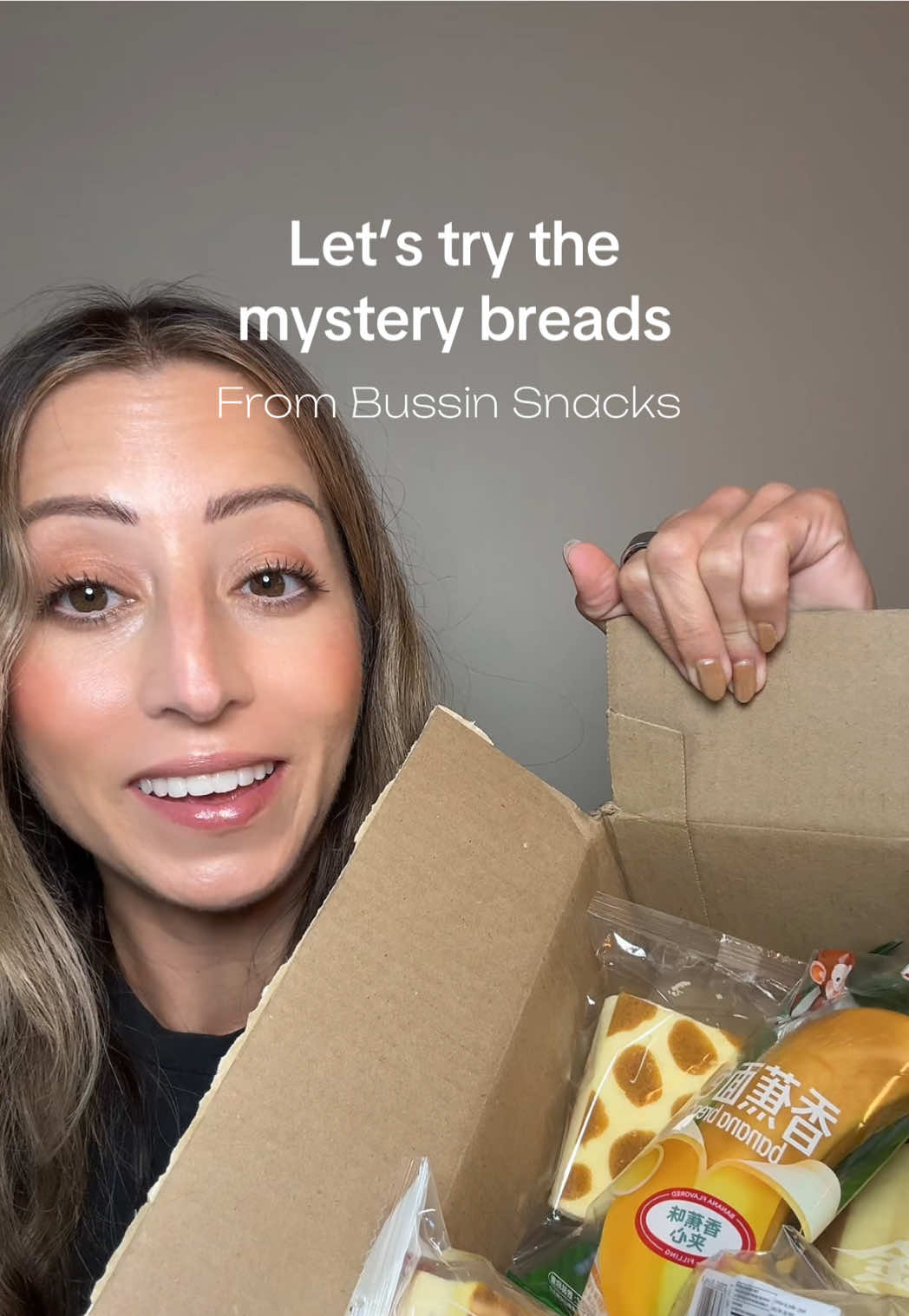 TikTok post by @carrissa_22 for Bussin Snacks. Caption reads: [...] breads?! Trying them out from @Bussin....
