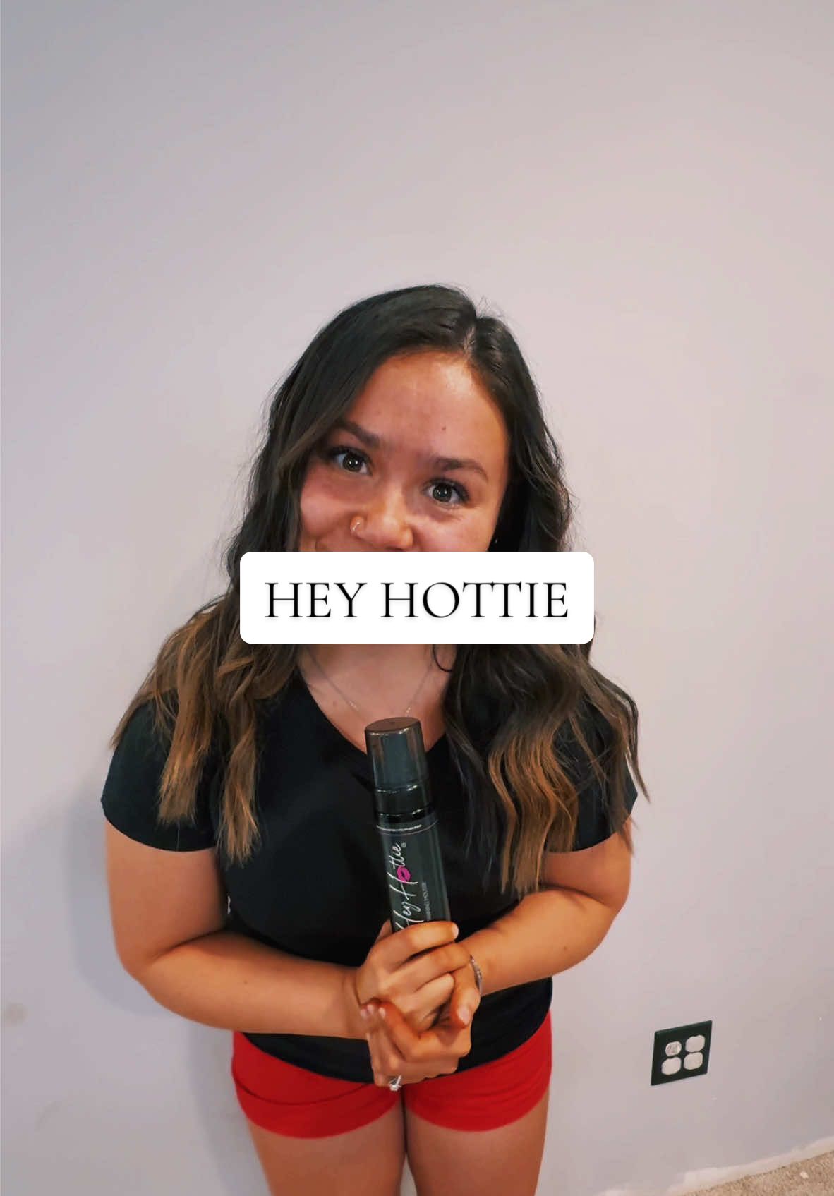 TikTok post by @isabelviveross for Hey Hottie. Caption reads: GIRL, SAY WHAT!! @Hey Hottie Cosmetics.